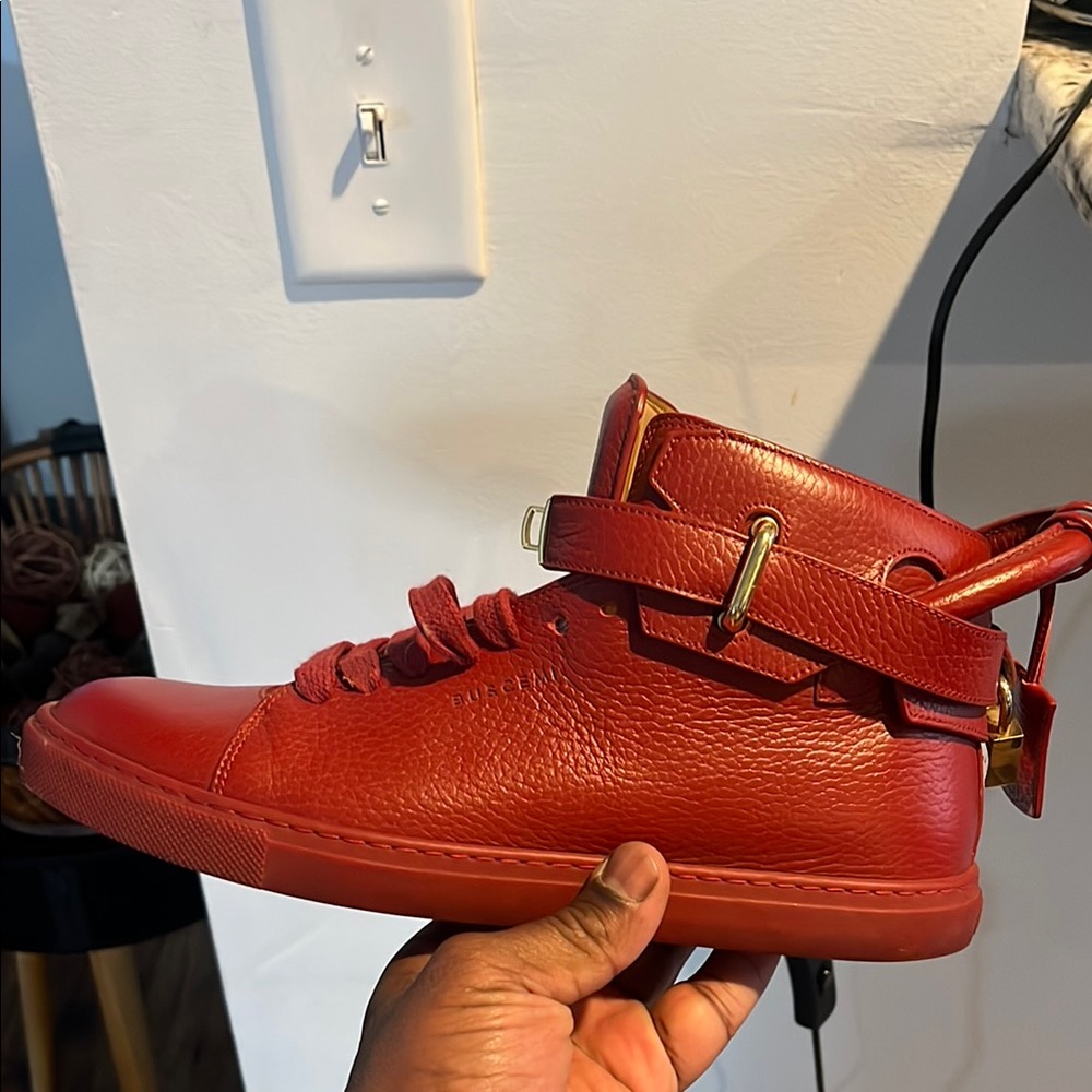 Red High-Top Sneakers with Gold Accents